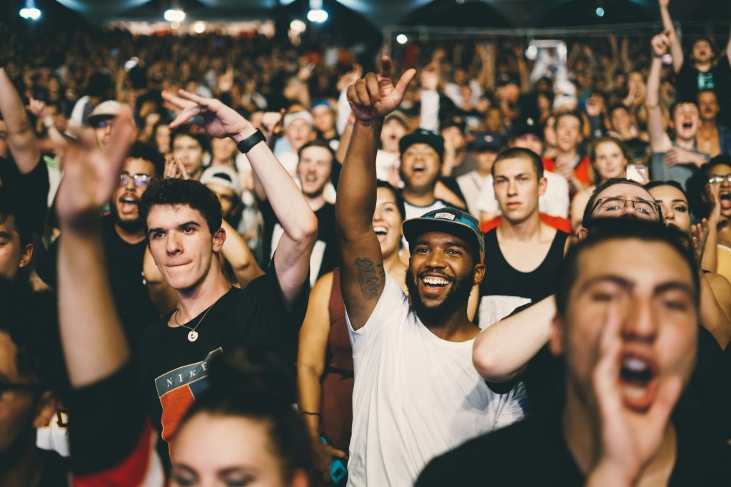 a crowd of people cheering