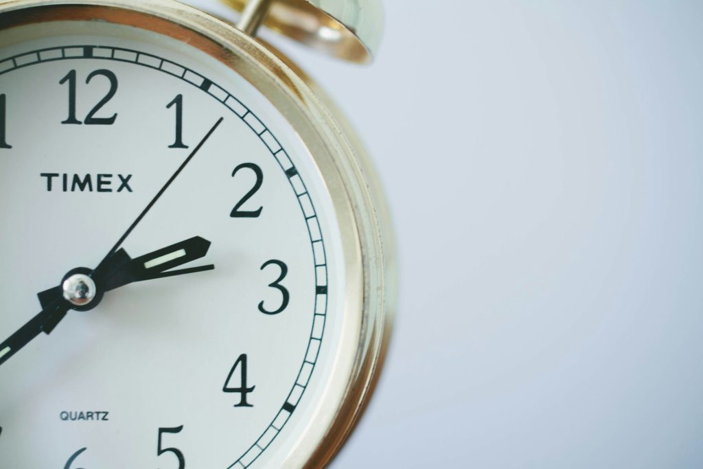 close-up image of a clock for time management