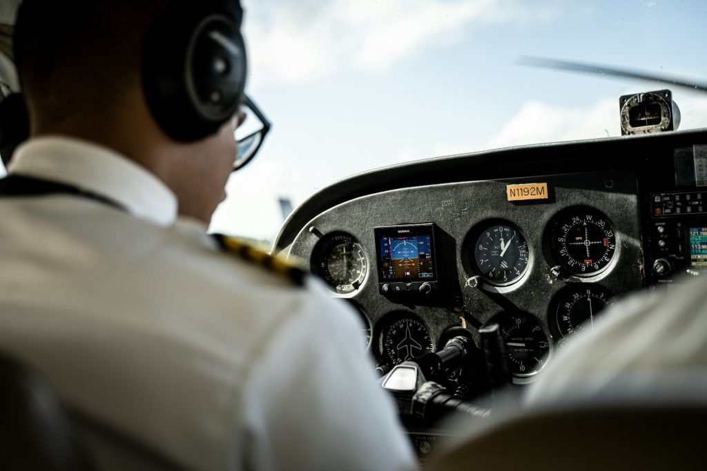 a pilot marks off his pre-flight checklist