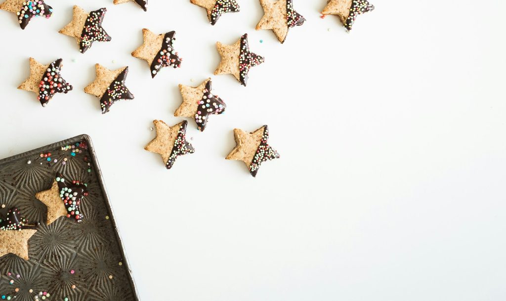 a collection of star-shaped Christmas cookies